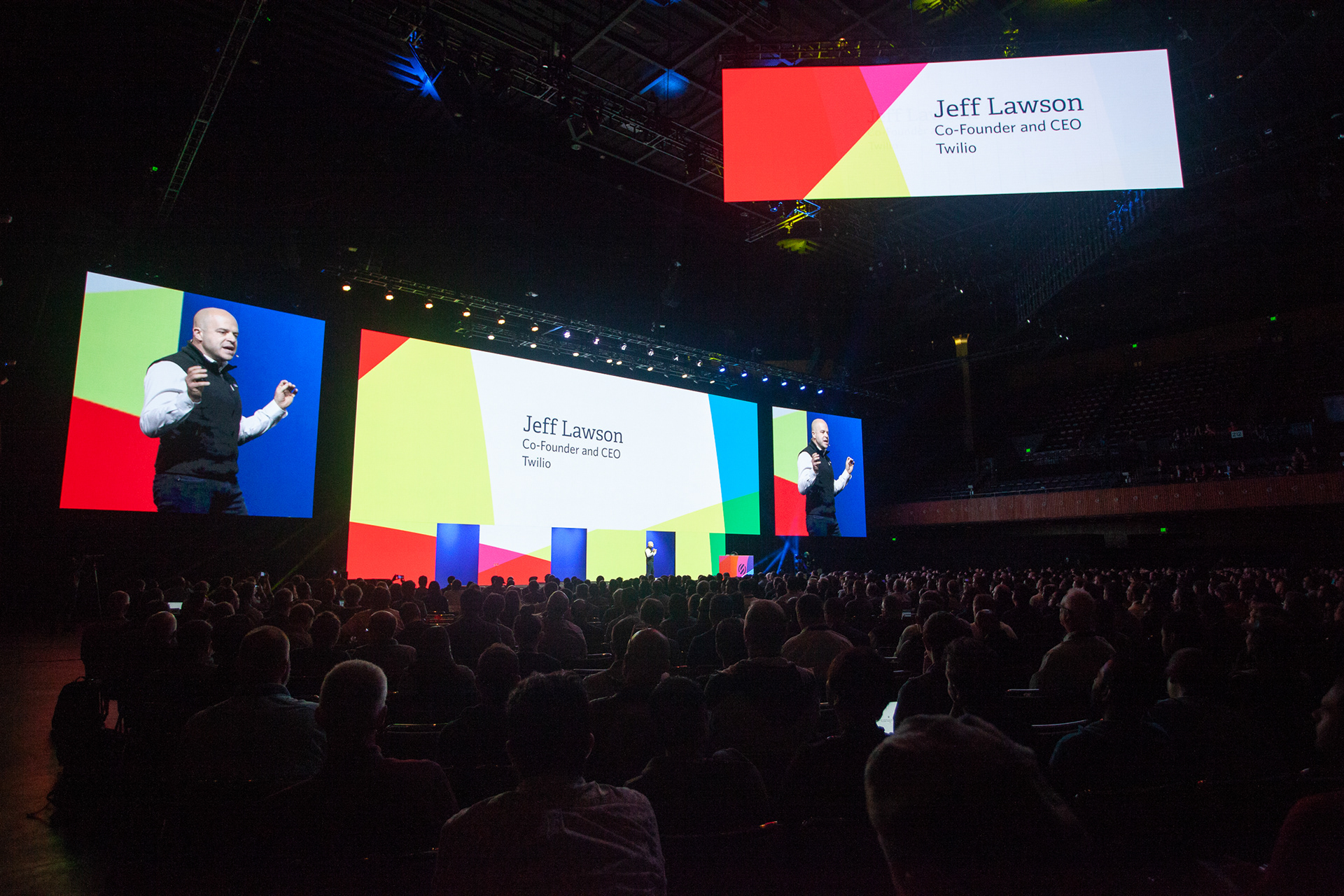 Jeff Lawson presenting keynote at Twilio Signal with his name displayed on IMAG screens